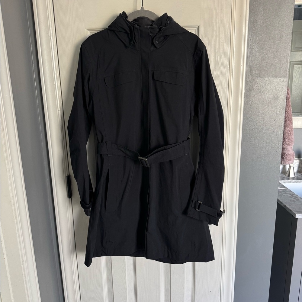 REI black rain jacket, fits like a small- excellent condition